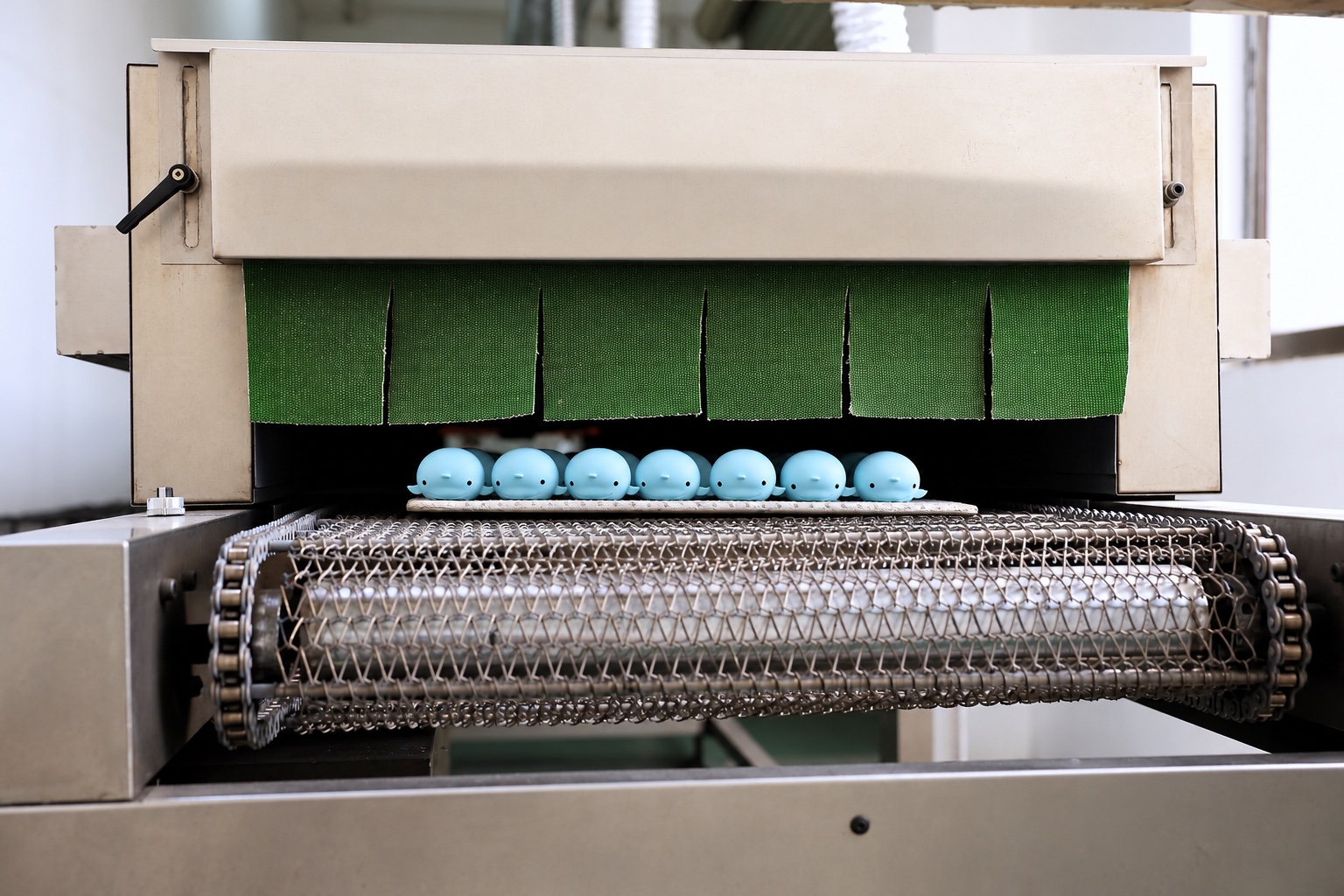 Silicone products on a factory processing conveyor